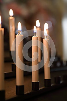 Closeup of candles, Rupert Mayer Church Unterkirche in Citizen`s Hall Church BÃ¼rgersaalkirche Munich MÃ¼nchen, Bavaria Bayer