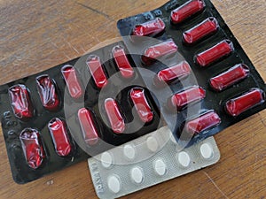 Closeup with capsule pills from pharmacy supplied..