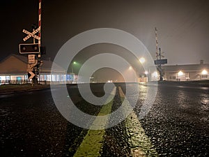 Closeup of a Caption
Railway crossing across Vasse Highway on rainy night, Pemberton,