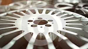 closeup of car alloy wheel in tire store or warehouse stock