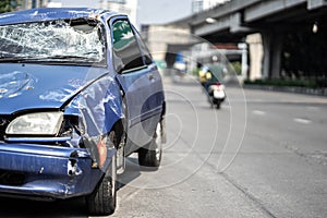 Closeup of car with broken windshield, damaged automobiles