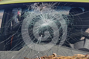 Closeup of car with broken windshield, Terrible dangerous car after a fatal accident. Broken windshield