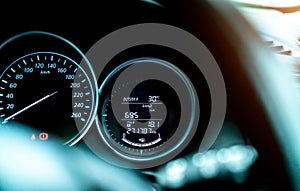 Closeup car fuel gauge dashboard panel. Gasoline indicator meter and speedometer. Fuel gauge show full gas tank. Data information