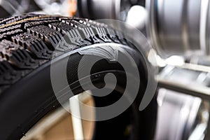 closeup of car tire, replacement of winter and summer tires