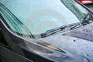 Closeup Car Wet Windshield Rain drop in Raining Season.