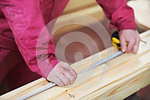 Closeup carpentry wood cross cutting