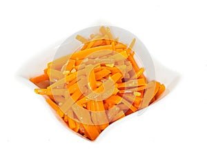 Closeup of carrot cut into julienne slices