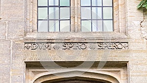 Closeup of carving above an entrance door at Nyman\'s House, National Trust property in West Sussex photo