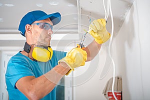 Electrician Stripping Wires photo