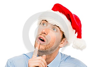 Closeup of caucasian man wearing christmas hat for santa isolate