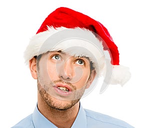 Closeup of caucasian man wearing christmas hat for santa isolate