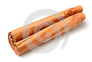 Closeup of Ceylon cinnamon stick isolated on the white background
