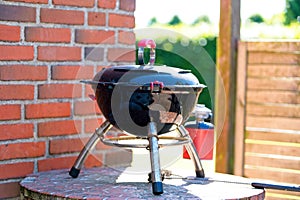 Closeup of a chafing dish placed outdoors