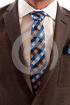 Closeup of checkered or plaid tie