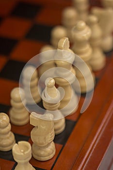 Closeup of chessboard, highlighted by the king