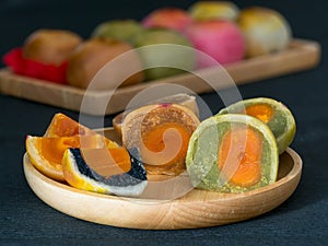 Closeup chinese cake in wooden plate.