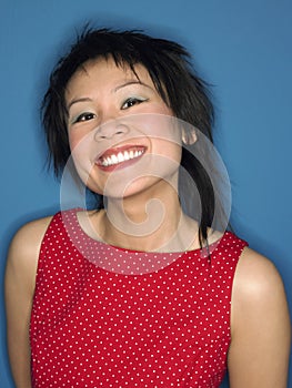 Closeup Of A Chinese Woman Grinning