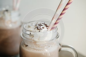 Closeup Chocolate smoothie milkshake in retro glass jar Maso