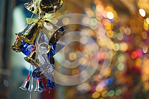 Closeup of Christmas holiday tree decorations with bokeh on background