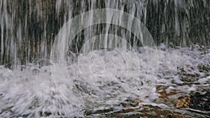 Closeup cinematic image of waterfall in the rainforest jungle at Amboro National Park, Bolivia photo