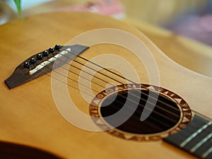 Closeup Classic and Folk Guitar. Beautiful Background.