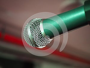 Closeup of classic microphone at concert on stage