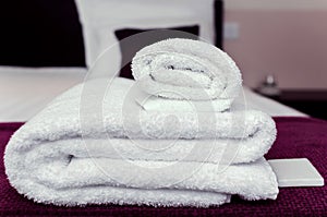 Closeup clean towels and soap in hotel room hygiene and hospitality concept