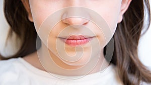 closeup clenched lips for doctor dentist and maxillofacial surgeon for children and adolescents photo