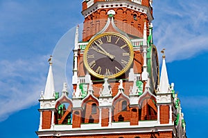 Closeup of clocks on Spasskaya Tower in Moscow, Russia photo