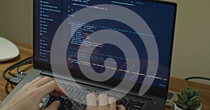 Closeup coding on screen, Man hands coding html and programming on screen laptop, development web, developer.