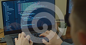 Closeup coding on screen, Man hands coding html and programming on screen Monitors, development web, developer.