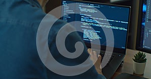 Closeup coding on screen, Man hands coding html and programming on two screen Monitors, development web, developer.