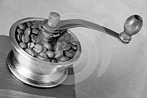 Closeup coffee bean and coffee grinder