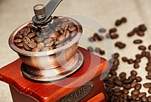 Closeup coffee bean and coffee grinder