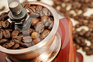 Closeup coffee bean and coffee grinder