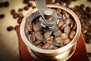 Closeup coffee bean and coffee grinder