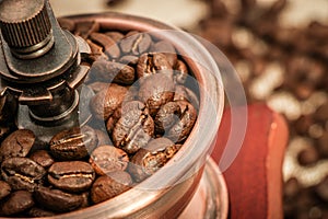 Closeup coffee bean and coffee grinder