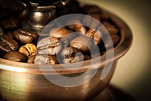 Closeup coffee bean and coffee grinder