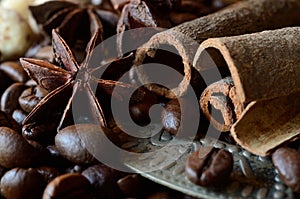 Closeup of coffee beans,anise , cinnamon sticks,food background