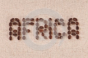 Closeup of coffee beans forming the word Africa