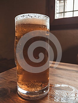 Closeup of Cold glass of beer in a bar