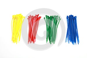 Closeup of colorful nylon cable ties isolated on white background