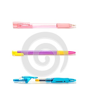 Closeup colorful pens , pink pen , purple pen , blue pen isolated on white background