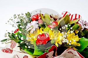 Closeup of colorful spring flowers bouquet on white background