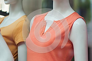 colorful teeshirt on mannequin in fashion store for women showroom photo