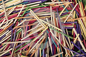 Closeup of colourful matchsticks making an abstract background