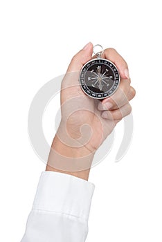 Closeup compass in hand isolated on white background