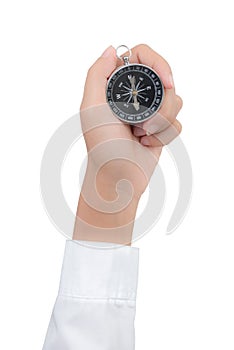 Closeup compass in hand isolated on white background