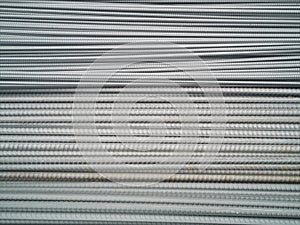 Closeup of concrete reinforcement steel rods in warehouse. Steel rods or bars used to reinforce concrete Steel rod. Construction