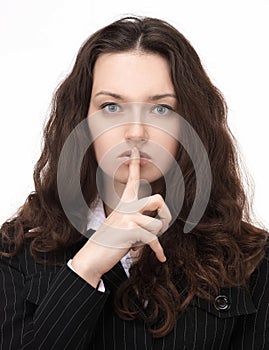 Closeup.confident business woman making a gesture of silence